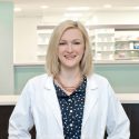 A headshot of Leah B. Argie inside the pharmacy